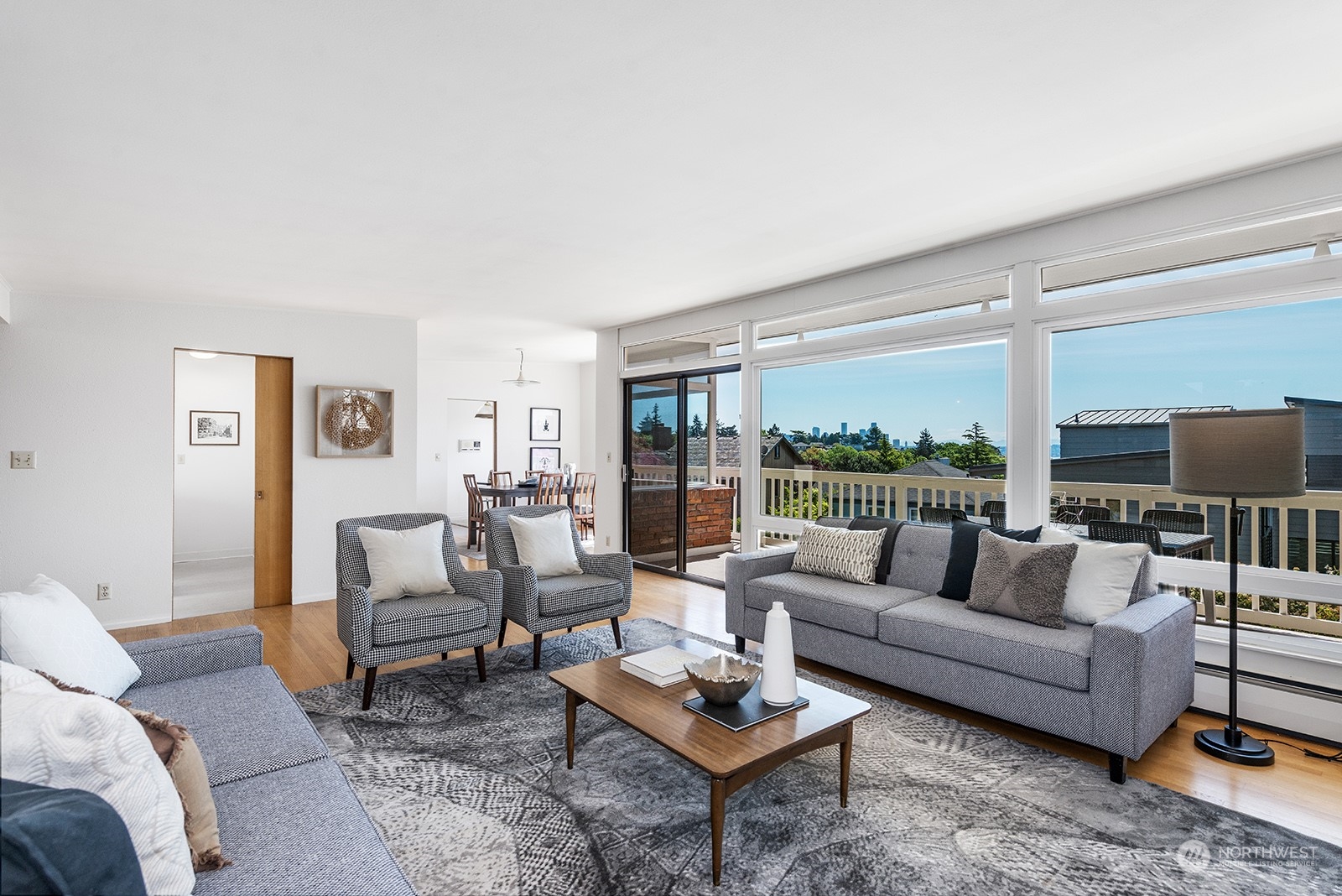 3513 West Howe Street Seattle, WA 98199 - Photo 6 of 39 a living room with furniture and a large window