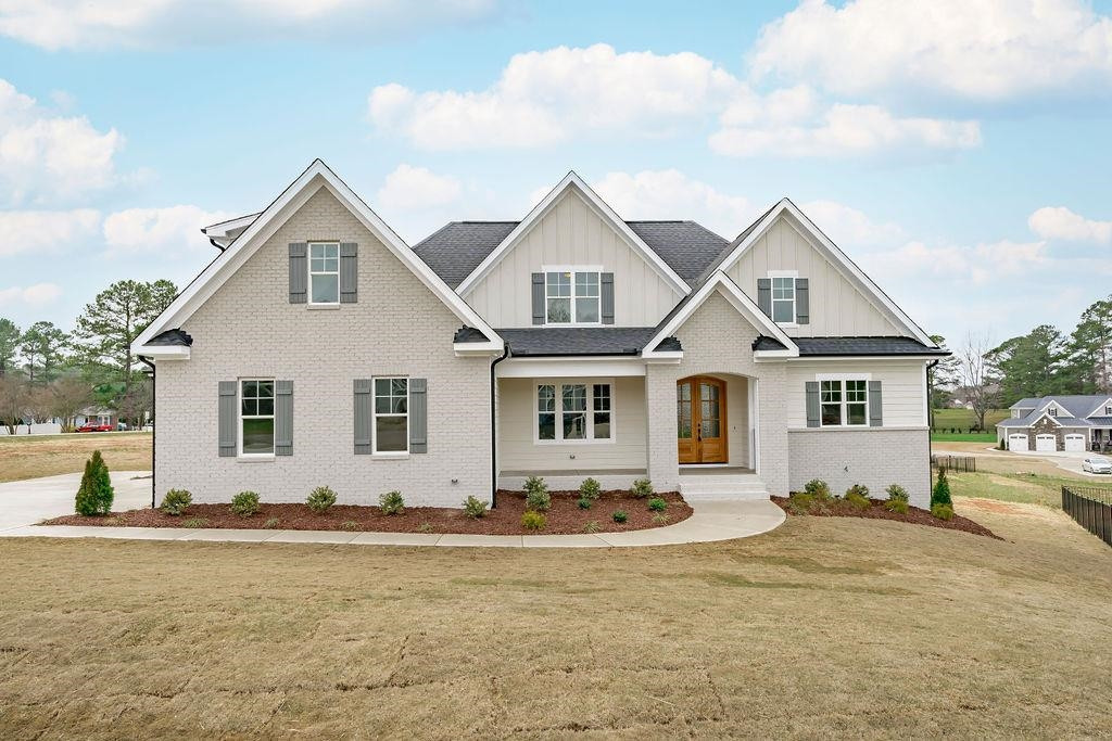 Gorgeous custom built home sits on almost an acre lot! Exterior Front