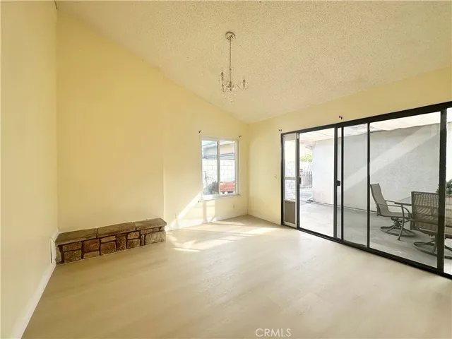 a view of a room with large windows