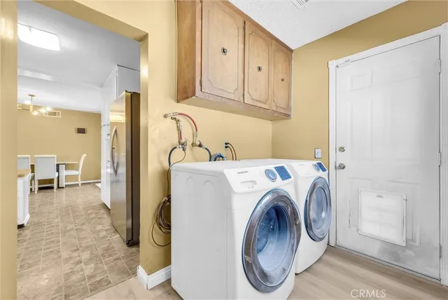 a view of utility room with washer and dryer