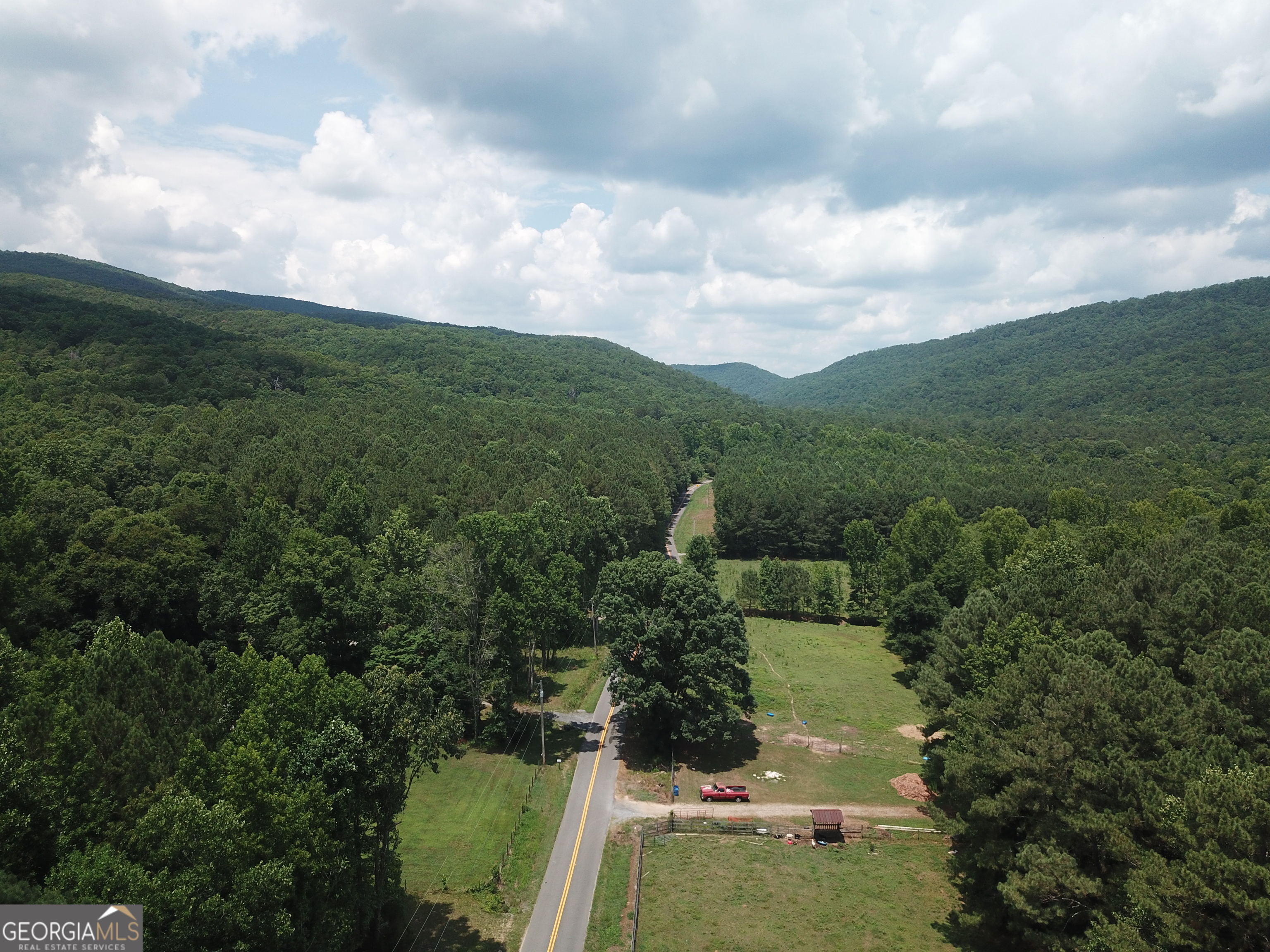 0 Everett Springs Road Armuchee, GA 30105 - Photo 22 of 23 a view of a city with lush green forest