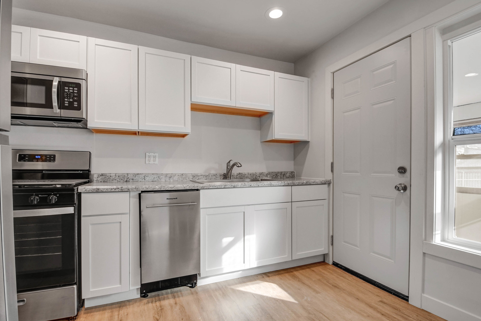 10313 South Church Street Chicago, IL 60643 - Photo 11 of 27 a kitchen with stainless steel appliances granite countertop a stove and a sink