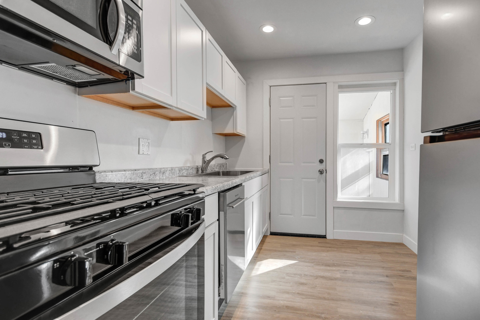 10313 South Church Street Chicago, IL 60643 - Photo 12 of 27 a kitchen with a stove and a refrigerator
