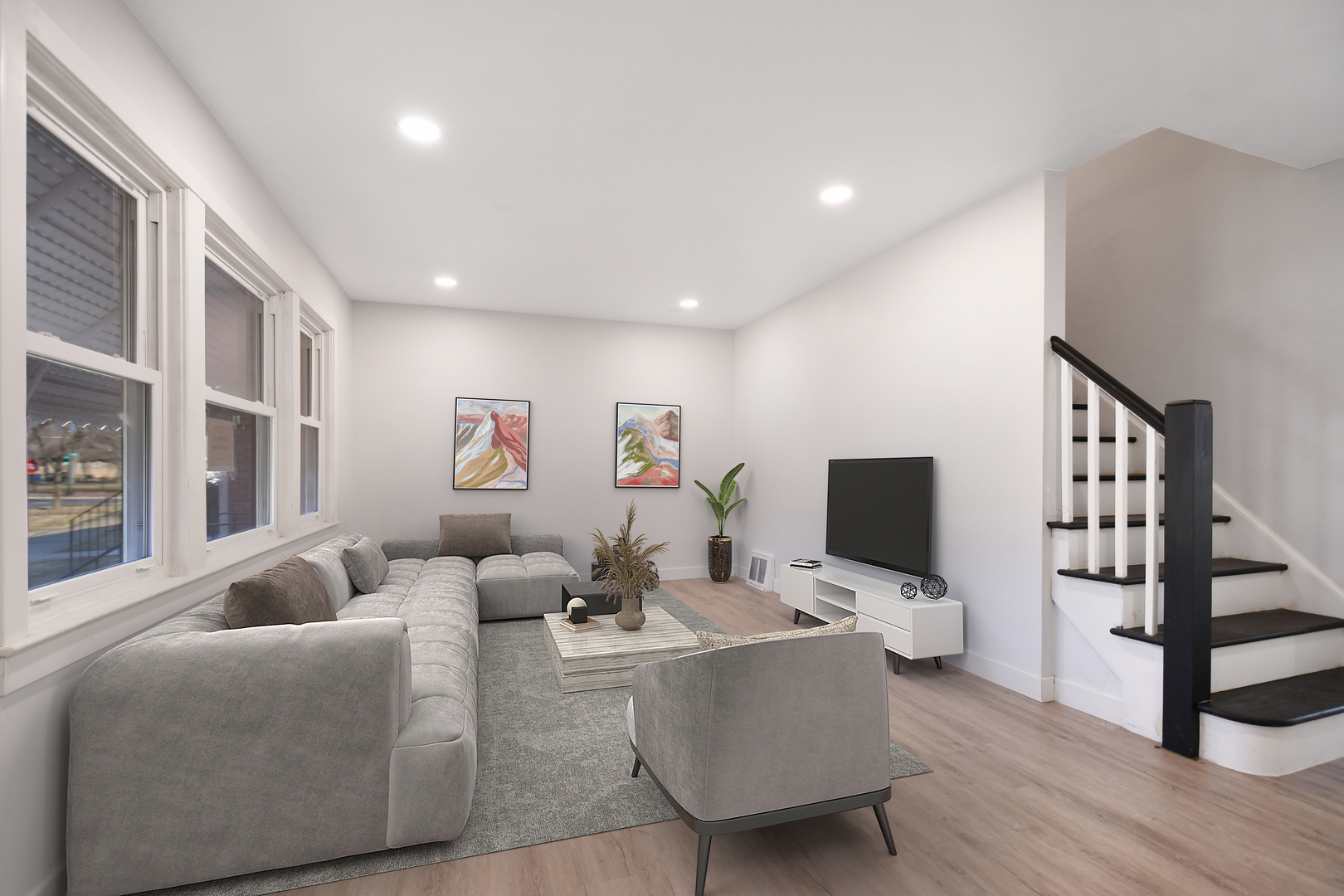 10313 South Church Street Chicago, IL 60643 - Photo 2 of 27 a living room with furniture a rug and a flat screen tv