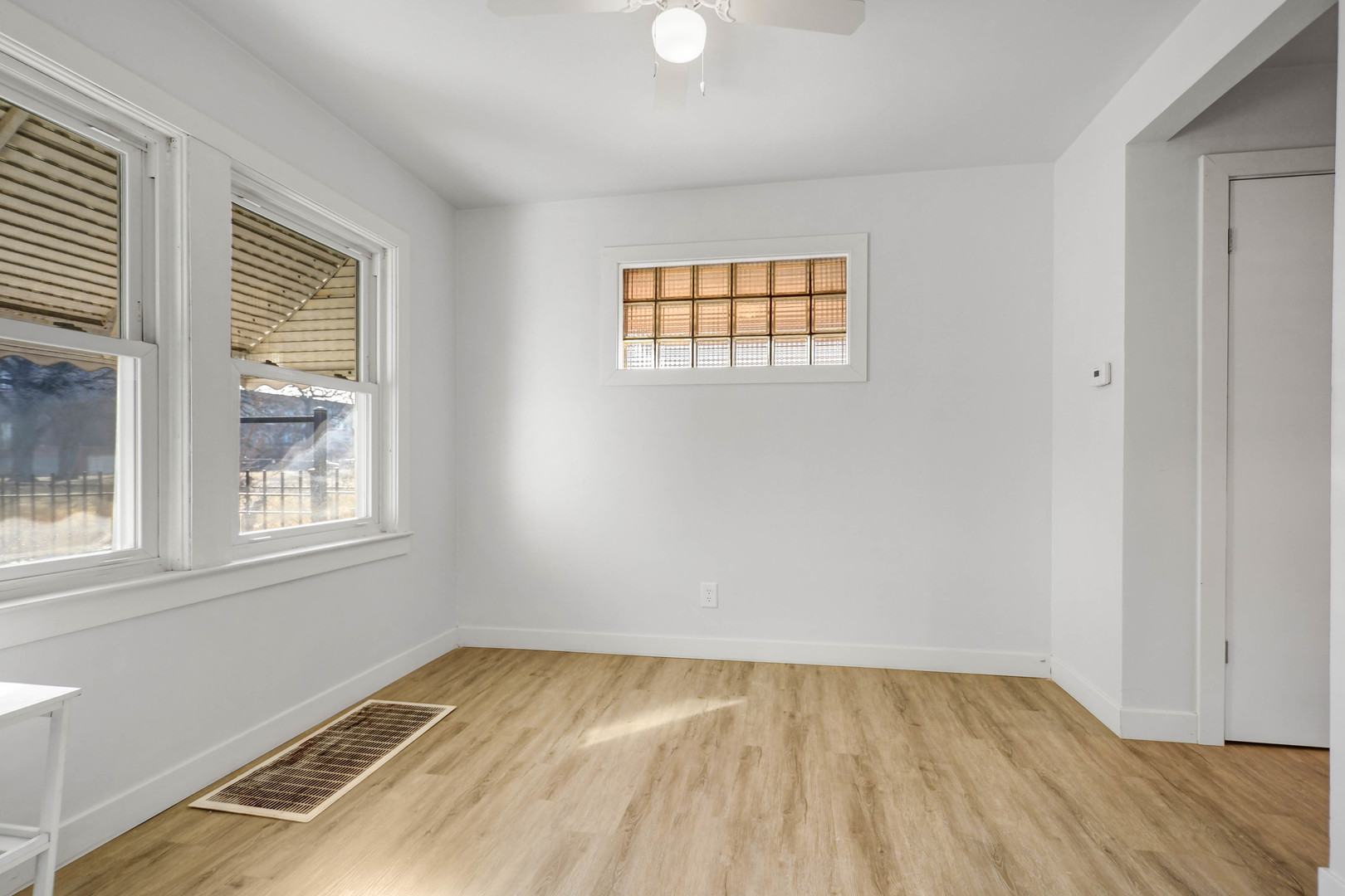 10313 South Church Street Chicago, IL 60643 - Photo 10 of 27 an empty room with a window