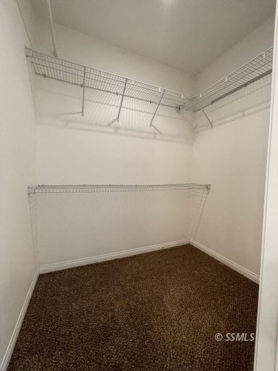 1133 West Benson Avenue Ridgecrest, CA 93555 - Photo 17 of 34 a view of a room with racks on the wall