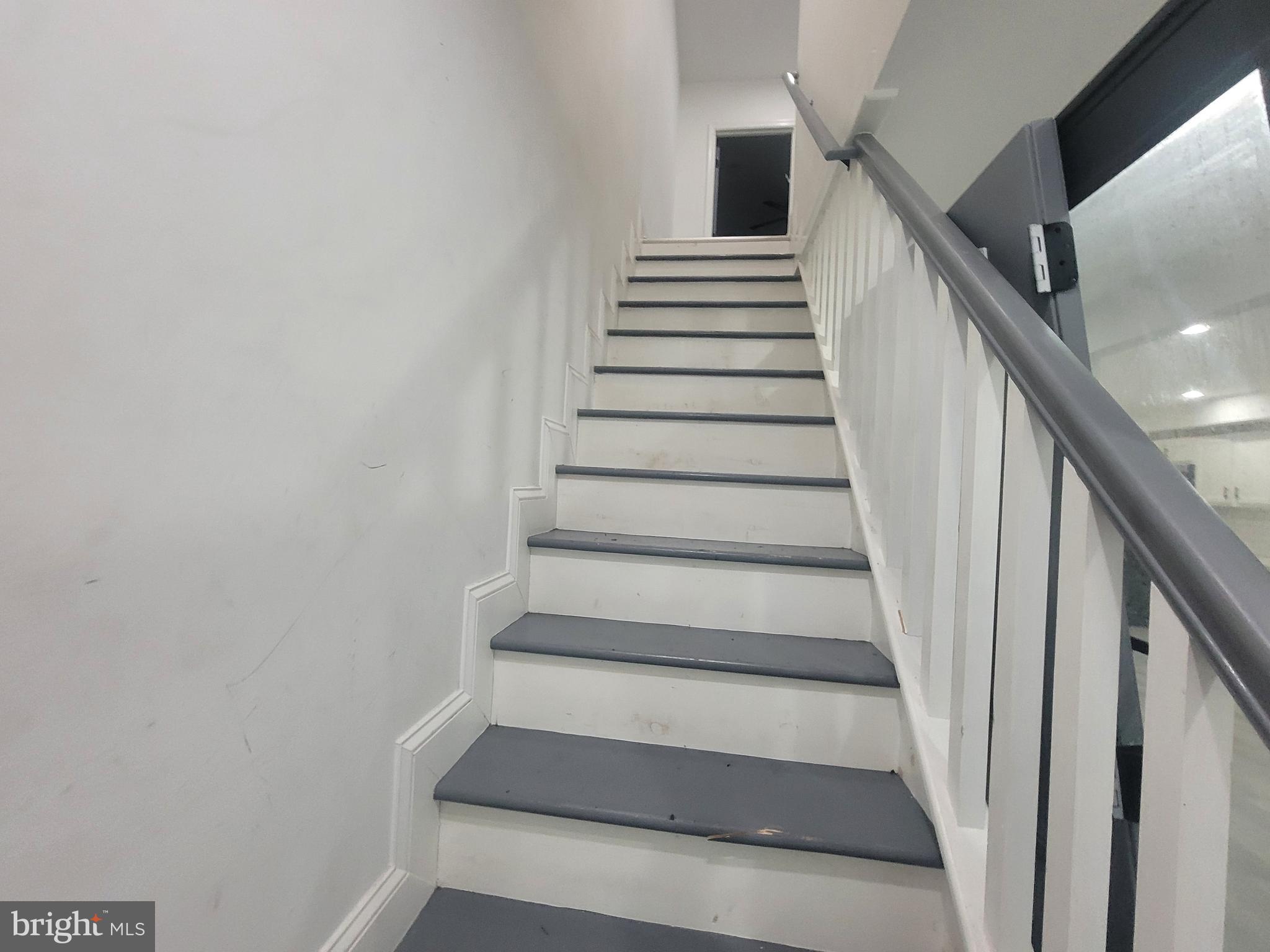 3833 Reisterstown Road Baltimore, MD 21215 - Photo 9 of 22 Stairs to upper level