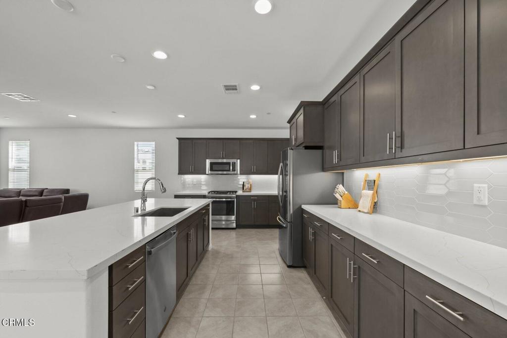 151 Rose Street Fillmore, CA 93015 - Photo 15 of 49 a kitchen with lots of counter top space