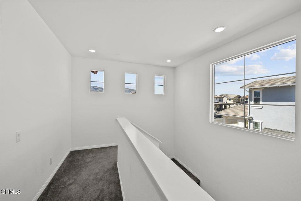 151 Rose Street Fillmore, CA 93015 - Photo 17 of 49 a view of a hallway with workspace