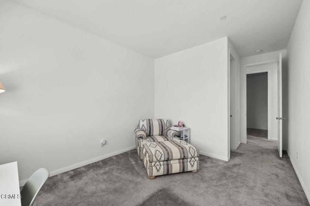 151 Rose Street Fillmore, CA 93015 - Photo 19 of 49 a bedroom with a bed and a couch