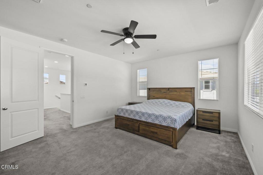 151 Rose Street Fillmore, CA 93015 - Photo 24 of 49 a spacious bedroom with a bed and window