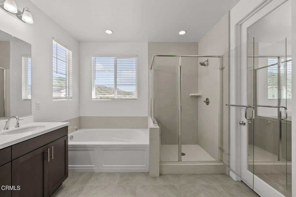 151 Rose Street Fillmore, CA 93015 - Photo 28 of 49 a spacious bathroom with a tub shower and sink