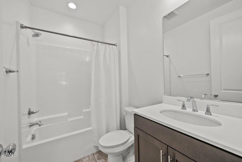151 Rose Street Fillmore, CA 93015 - Photo 29 of 49 a bathroom with a granite countertop sink toilet and shower