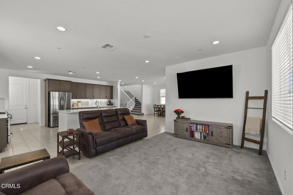 151 Rose Street Fillmore, CA 93015 - Photo 6 of 49 a living room with furniture and a flat screen tv
