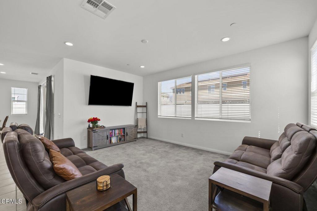 151 Rose Street Fillmore, CA 93015 - Photo 7 of 49 a living room with furniture and a flat screen tv