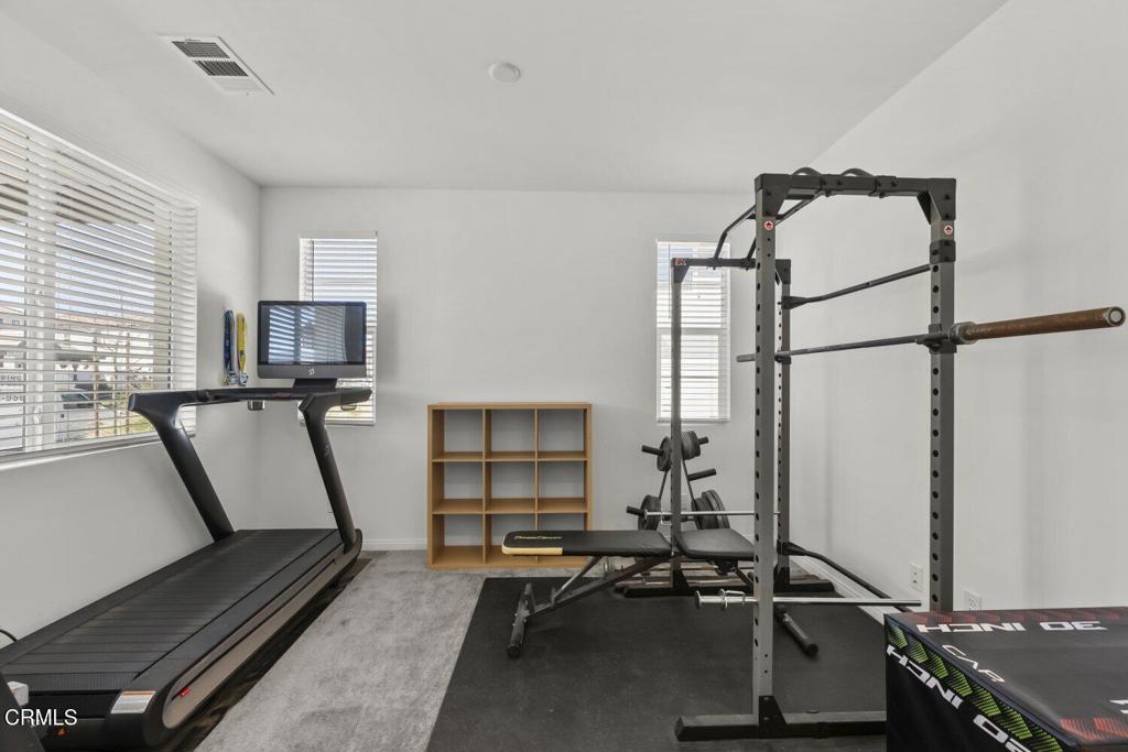151 Rose Street Fillmore, CA 93015 - Photo 8 of 49 a view of a room with gym equipment