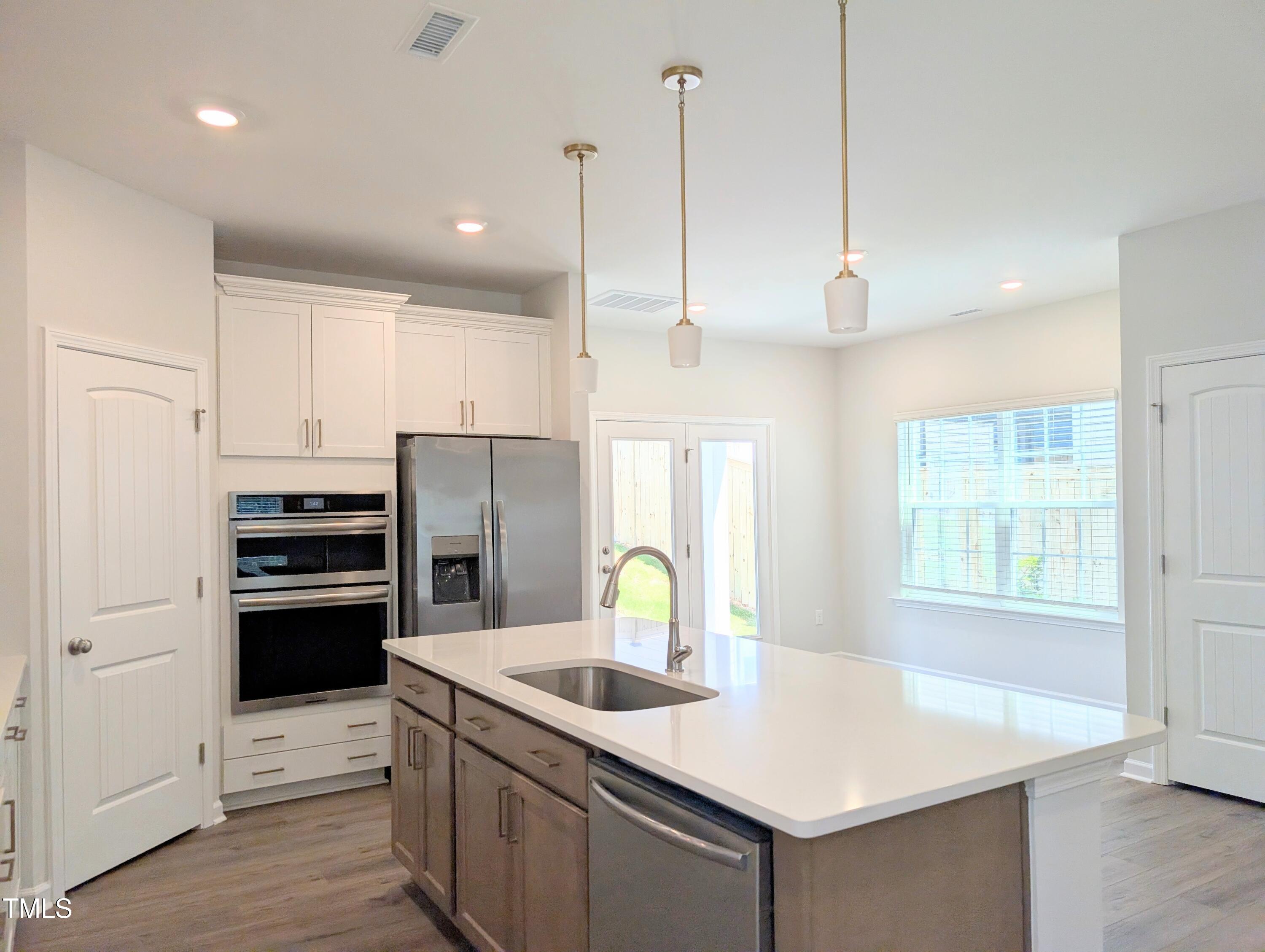 9224 Leaning Post Road, Unit 445 Wake Forest, NC 27587 - Photo 11 of 28 Pendant Lights Over Island