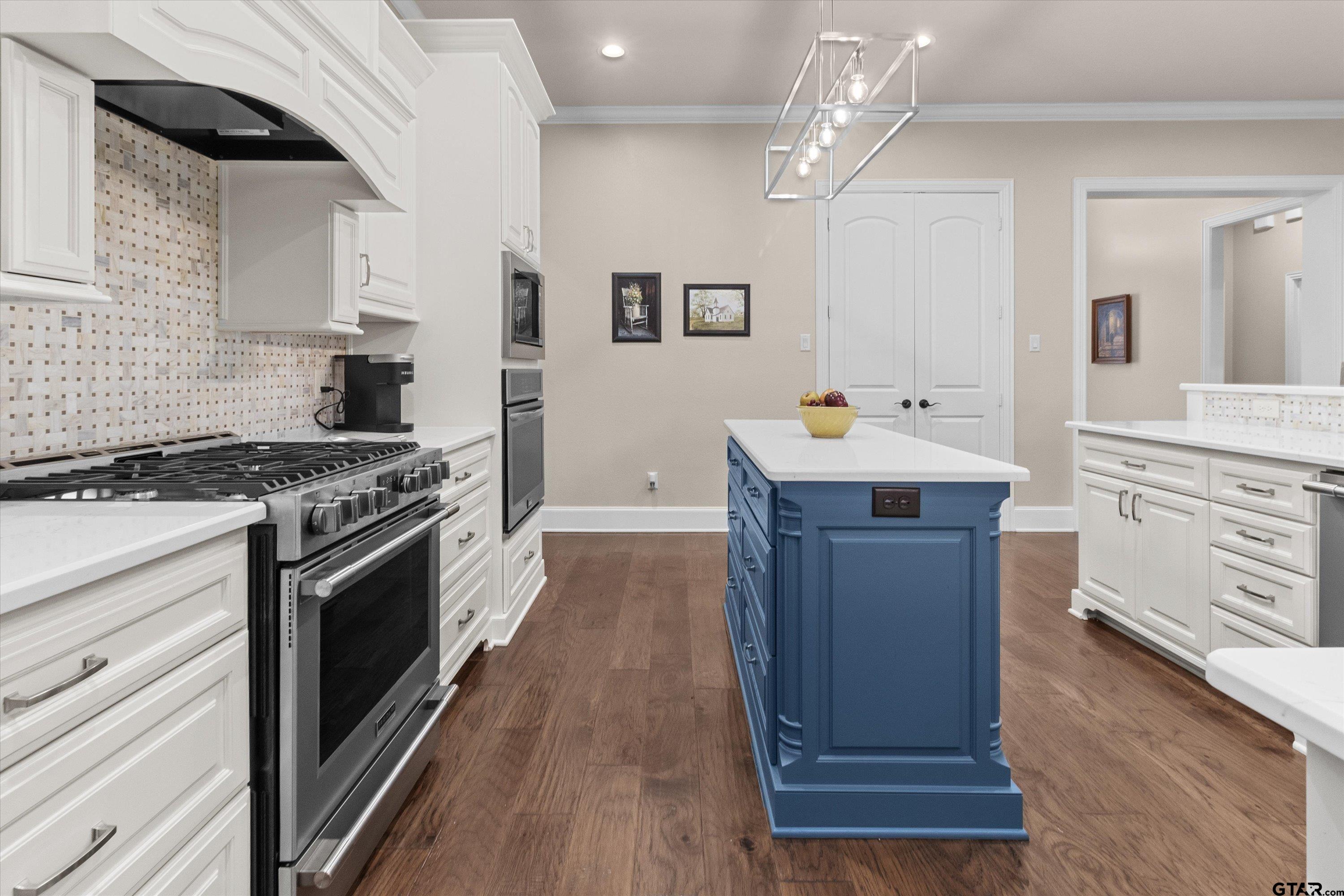 7423 Princedale Tyler, TX 75703 - Photo 12 of 31 a kitchen with stainless steel appliances granite countertop a sink stove and refrigerator