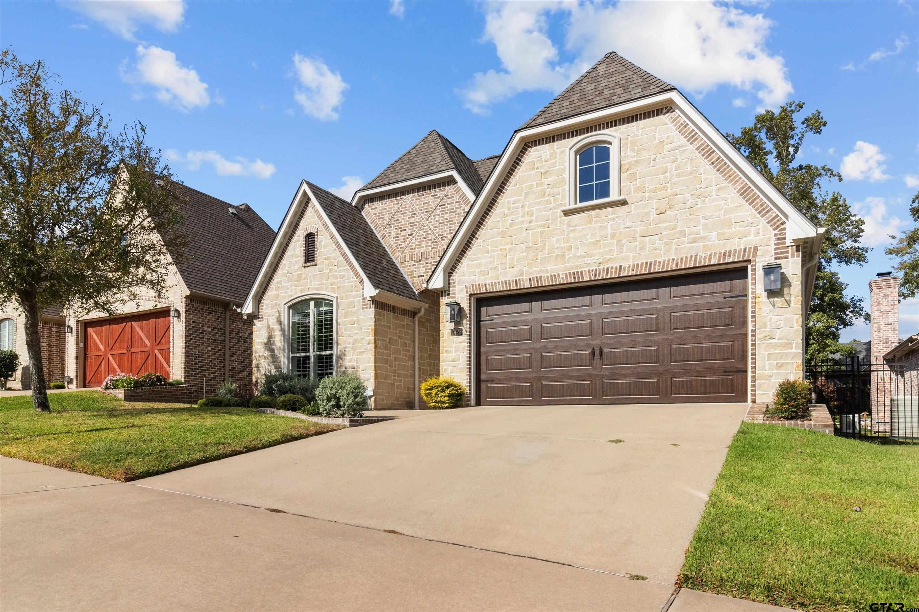 7423 Princedale Tyler, TX 75703 - Photo 2 of 31 a view of house with outdoor space and parking