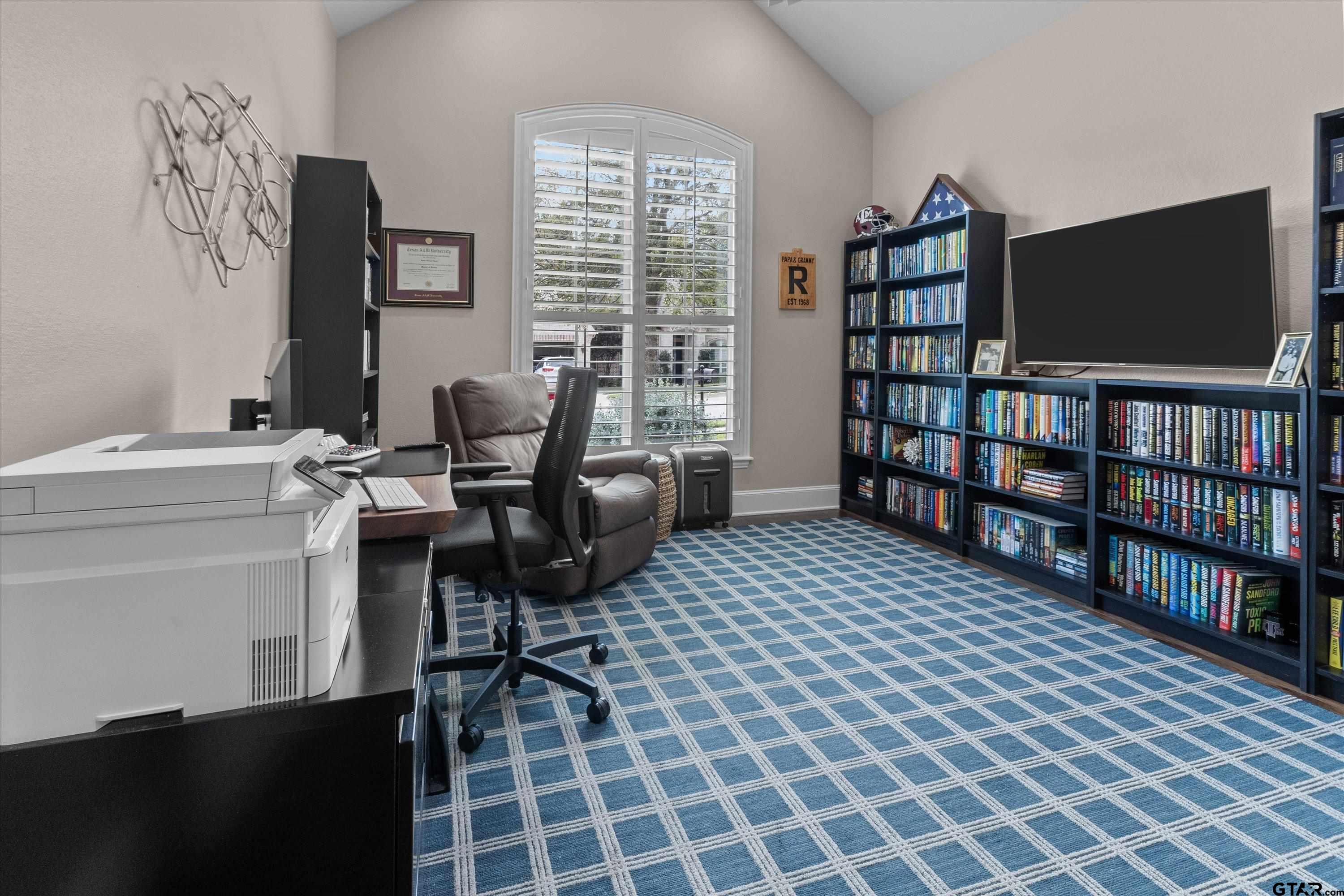 7423 Princedale Tyler, TX 75703 - Photo 27 of 31 a view of a livingroom with furniture and a book shelf