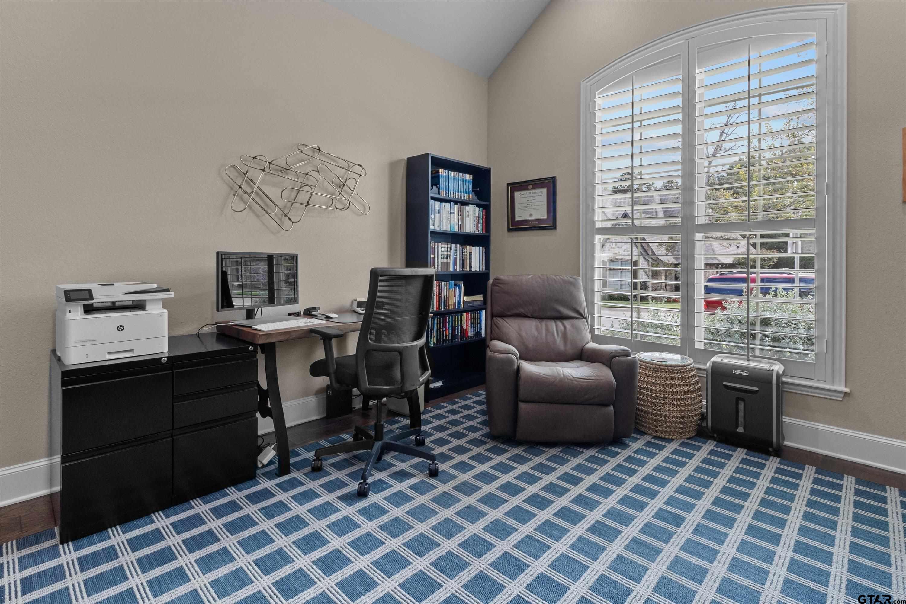 7423 Princedale Tyler, TX 75703 - Photo 28 of 31 a view of a workspace with furniture and a window