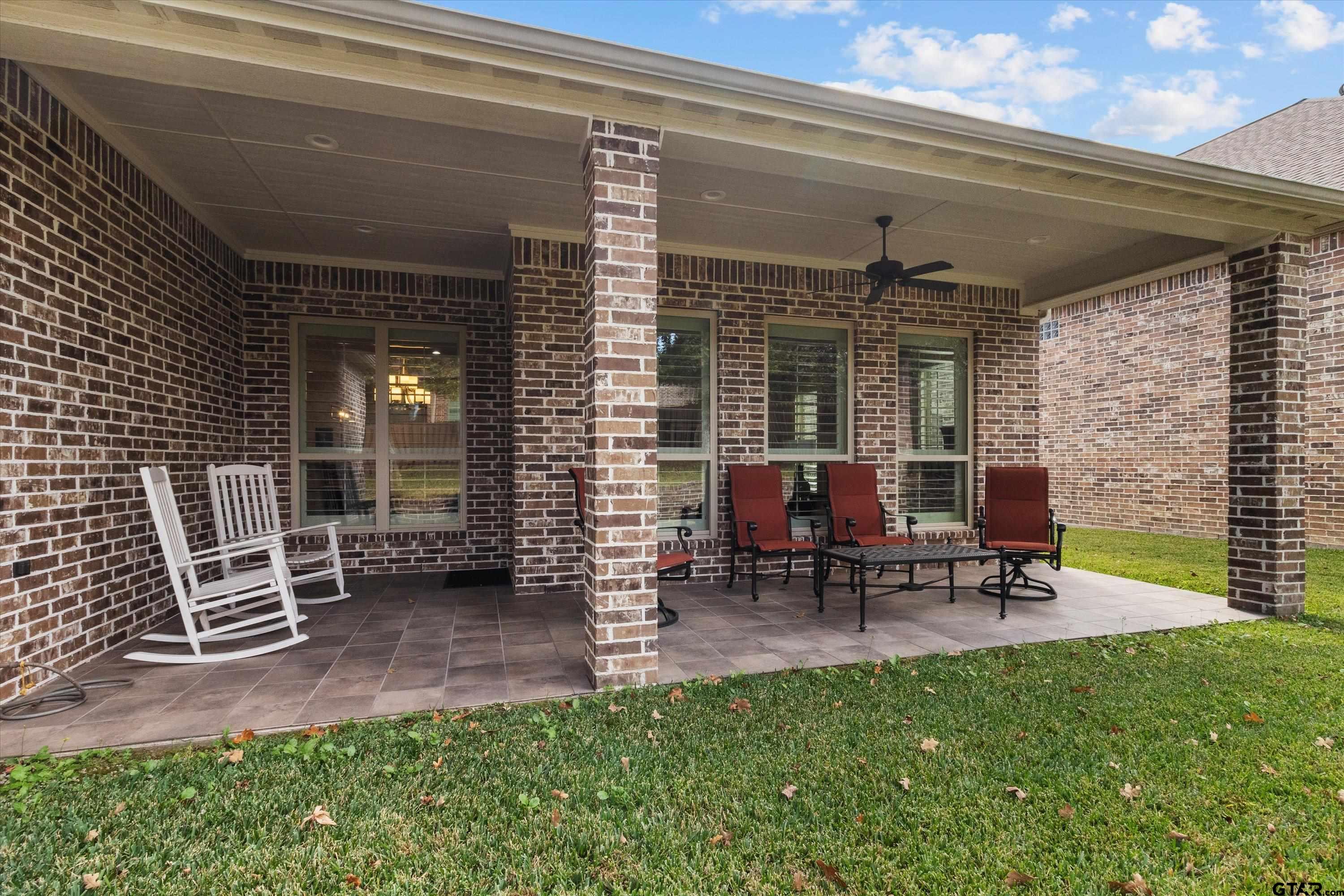 7423 Princedale Tyler, TX 75703 - Photo 30 of 31 a backyard of a house with outdoor seating