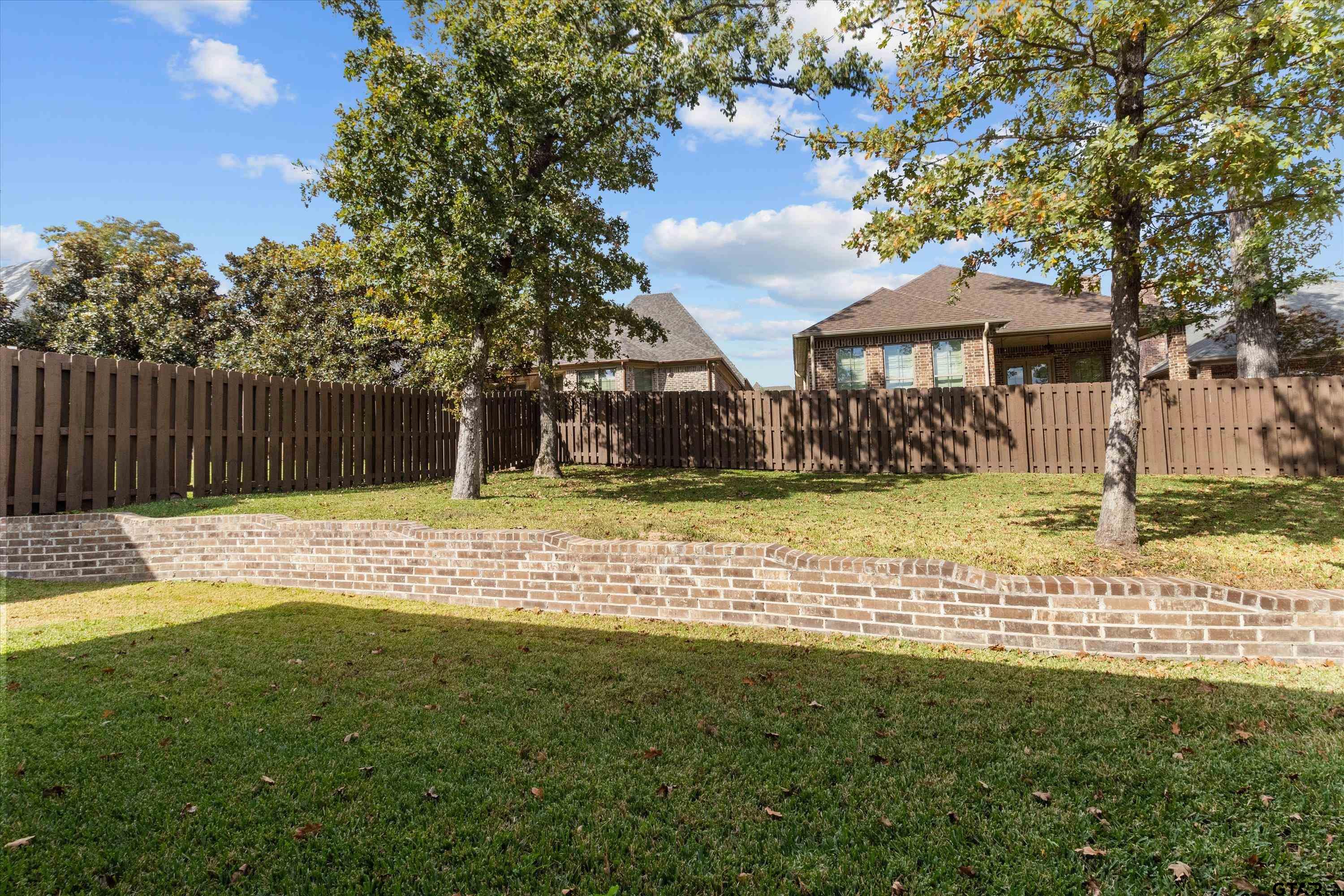 7423 Princedale Tyler, TX 75703 - Photo 31 of 31 a view of a house with a yard
