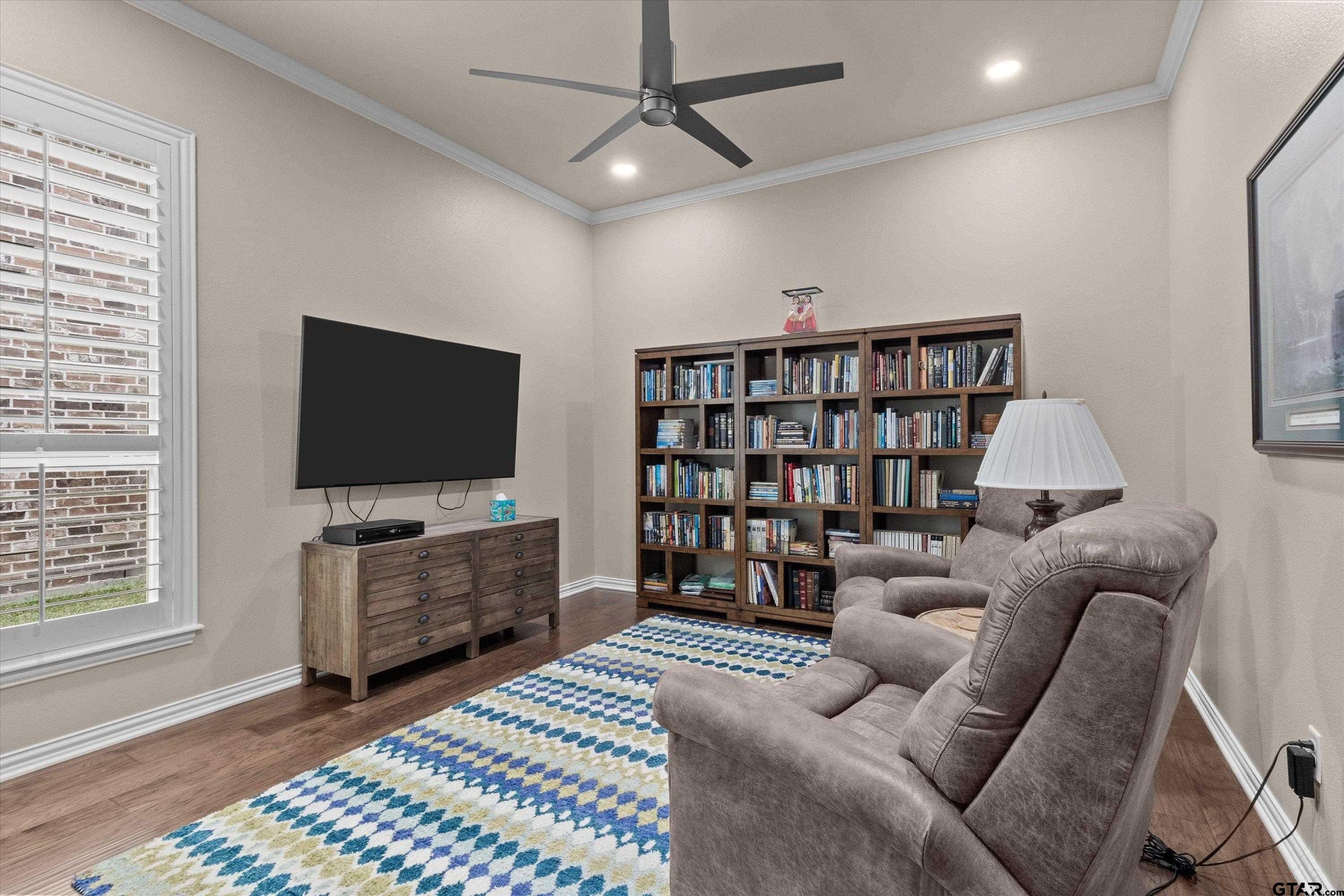 7423 Princedale Tyler, TX 75703 - Photo 4 of 31 a living room with furniture and a flat screen tv
