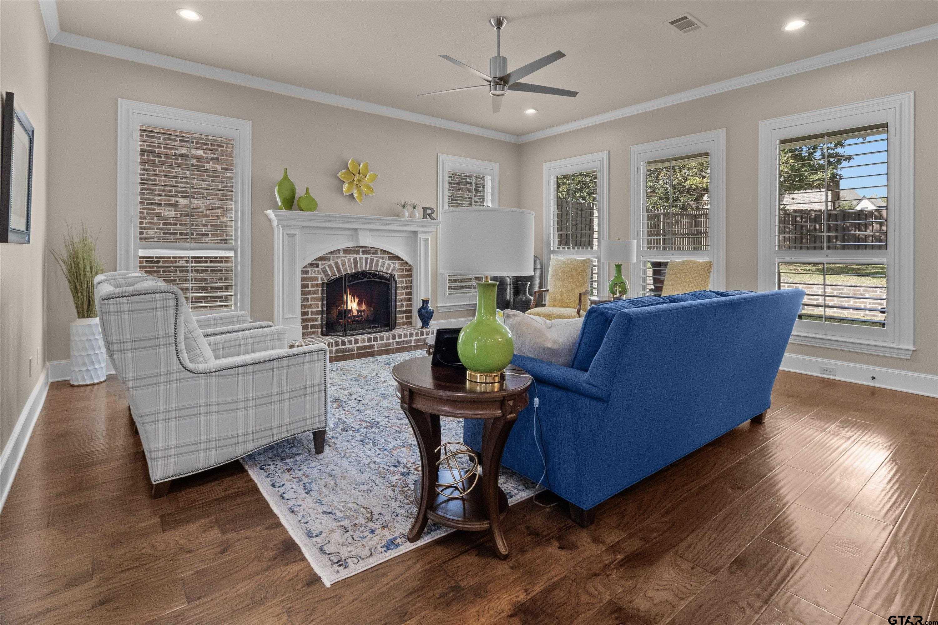 7423 Princedale Tyler, TX 75703 - Photo 6 of 31 a living room with furniture and a fireplace