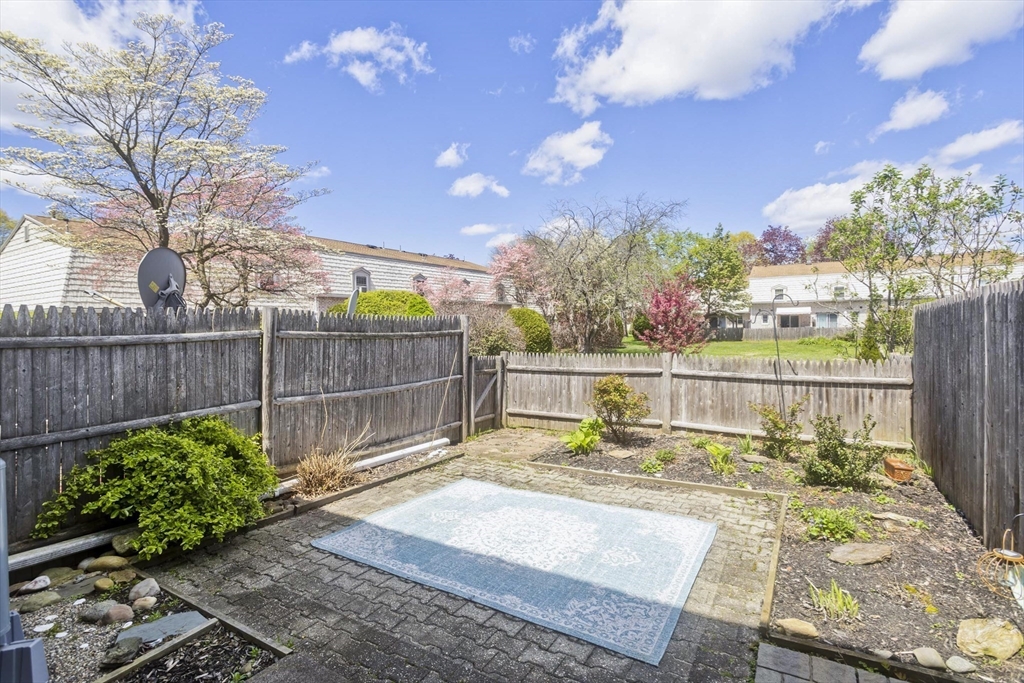 70 Corey Colonial, Unit 70 Agawam, MA 01001 - Photo 22 of 23 a view of a backyard with sitting area