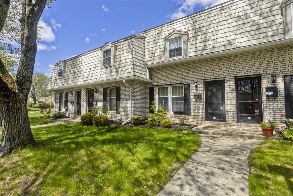70 Corey Colonial, Unit 70 Agawam, MA 01001 - Photo 23 of 23 a front view of a house with yard and green space