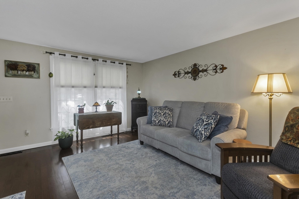 70 Corey Colonial, Unit 70 Agawam, MA 01001 - Photo 3 of 23 a living room with furniture and a table