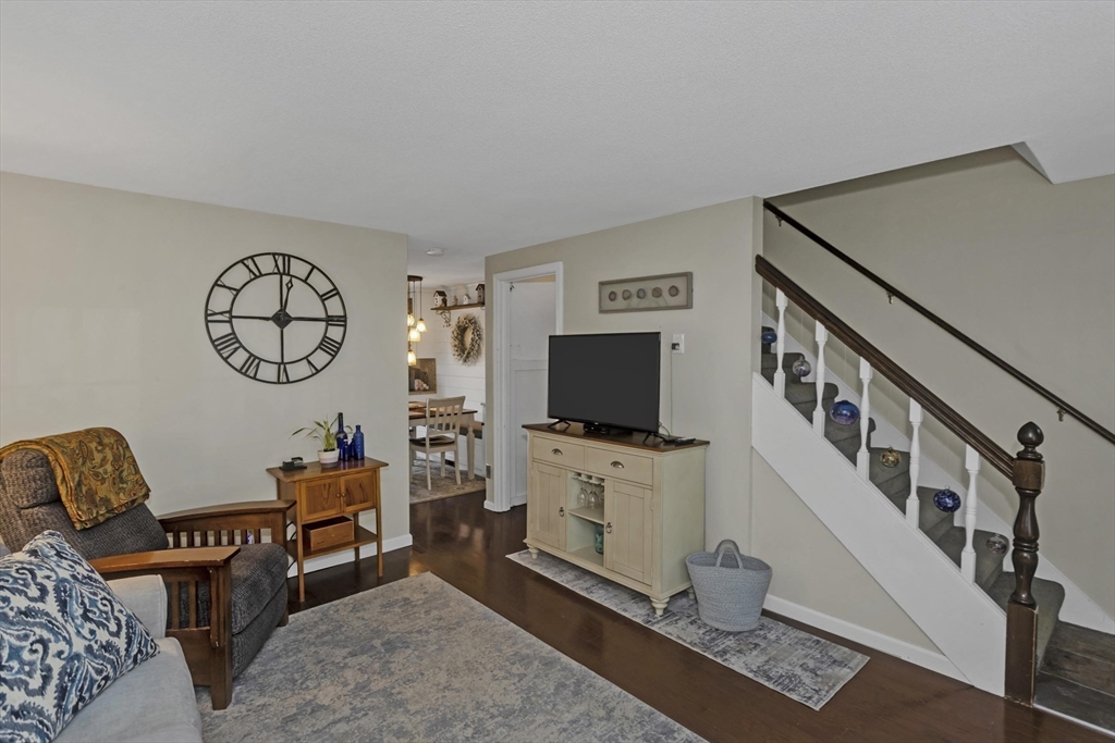 70 Corey Colonial, Unit 70 Agawam, MA 01001 - Photo 4 of 23 a living room with furniture and a flat screen tv