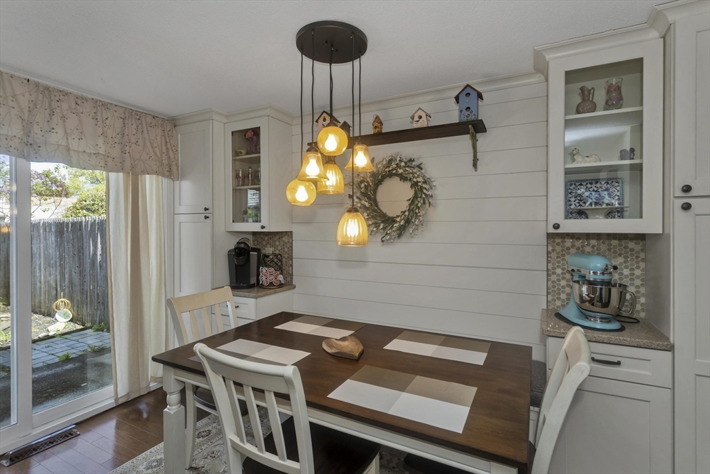 70 Corey Colonial, Unit 70 Agawam, MA 01001 - Photo 9 of 23 a living room with furniture and a chandelier