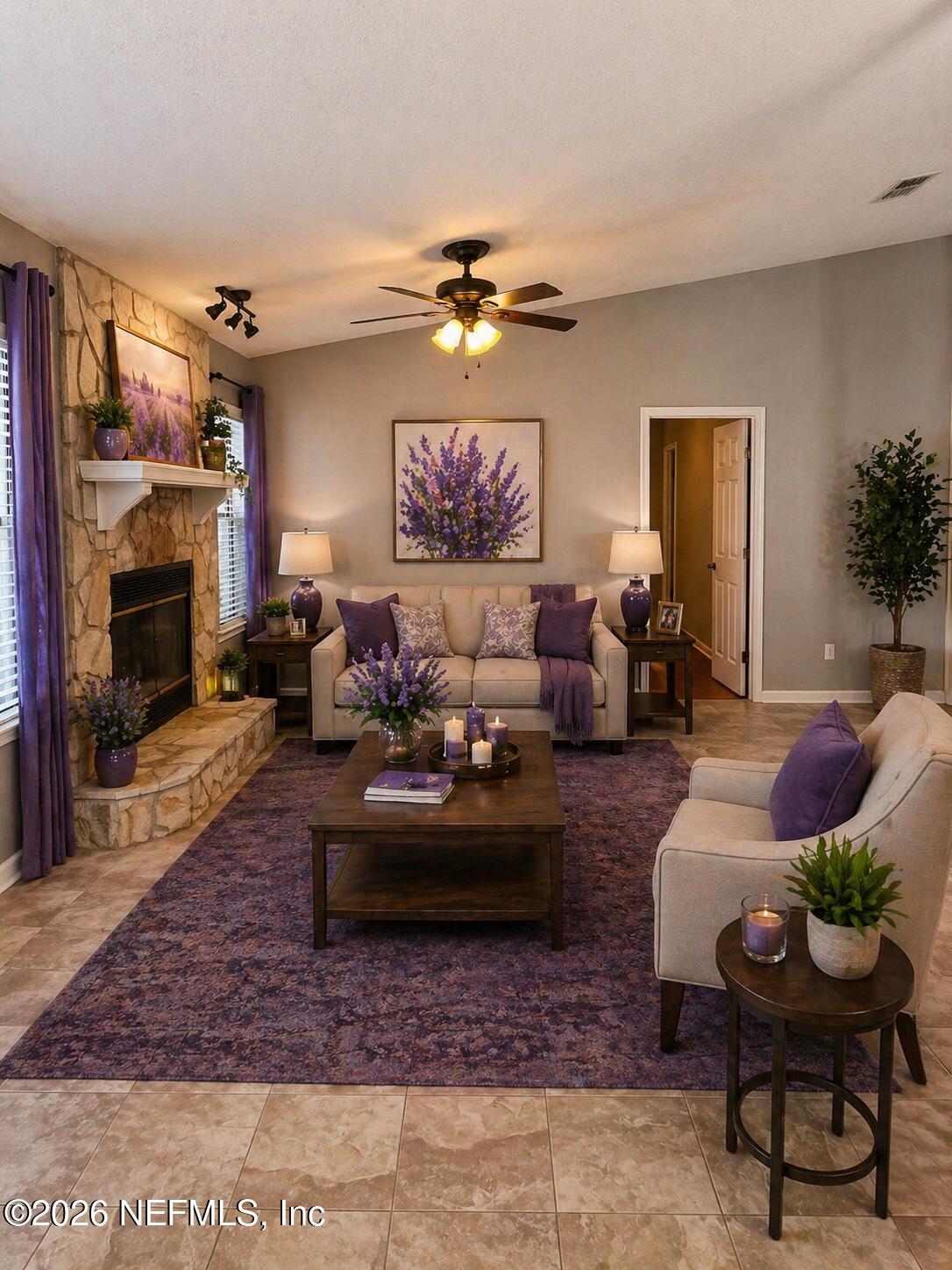 7820 Collins Ridge Boulevard East Jacksonville, FL 32244 - Photo 15 of 27 a living room with furniture and a fireplace