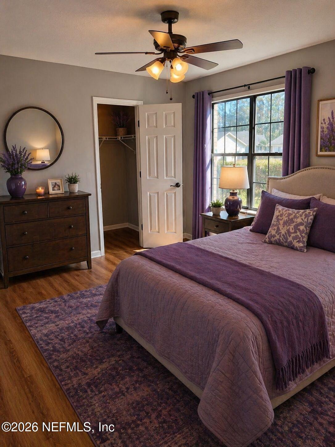 7820 Collins Ridge Boulevard East Jacksonville, FL 32244 - Photo 17 of 27 a bedroom with a bed and a dresser next to a window