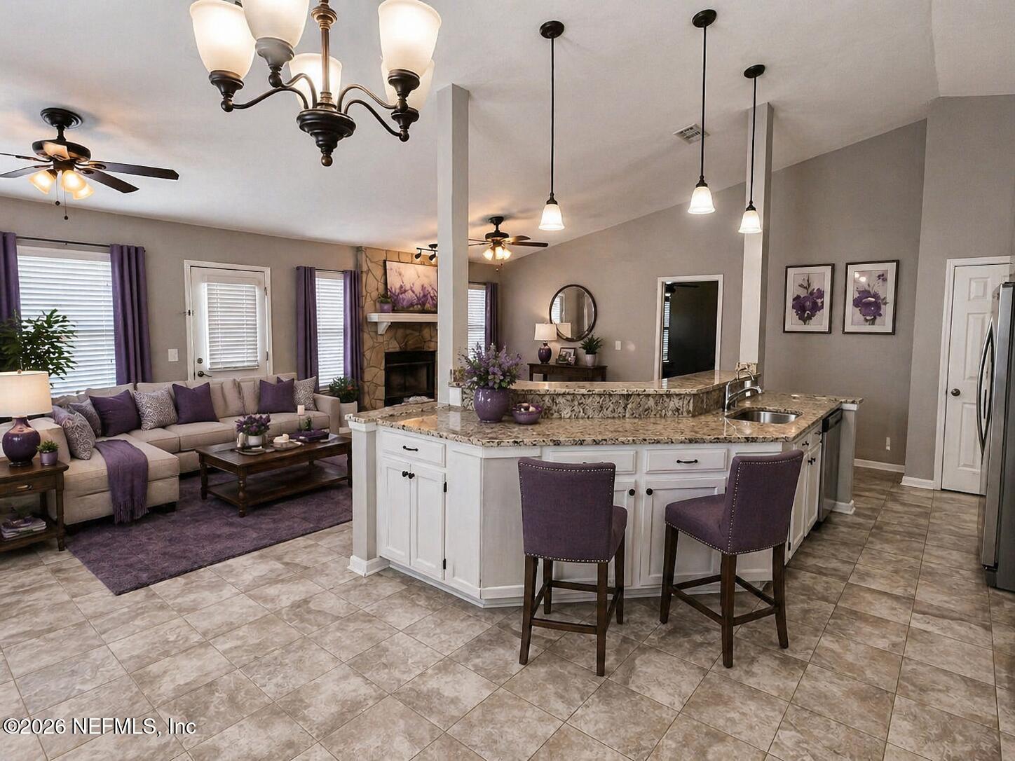 7820 Collins Ridge Boulevard East Jacksonville, FL 32244 - Photo 7 of 27 a view of a dining room furniture and a chandelier