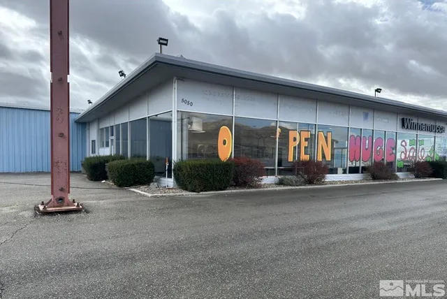 a view of a building with a street