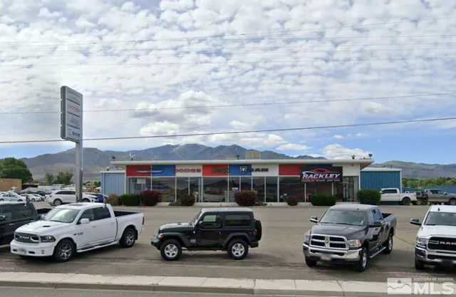 a view of a cars parked in front of a building