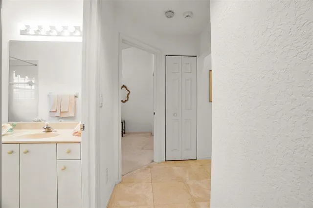 a view of a backyard with sitting area