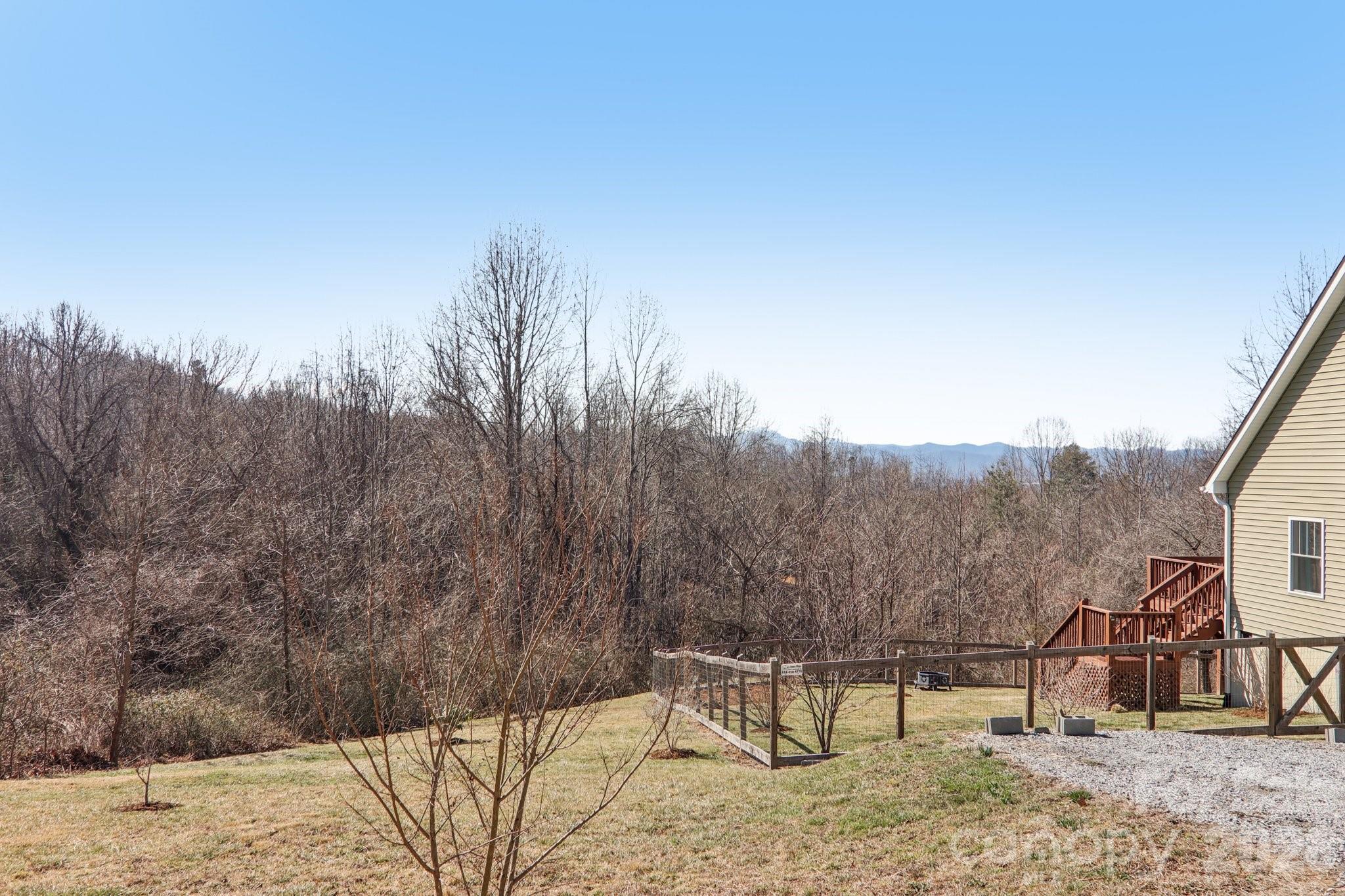 751 Hutch Mountain Road Fletcher, NC 28732 - Photo 39 of 48 a view of a outdoor space with trees