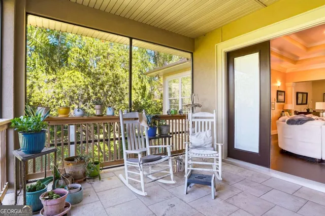 a balcony view with a garden space