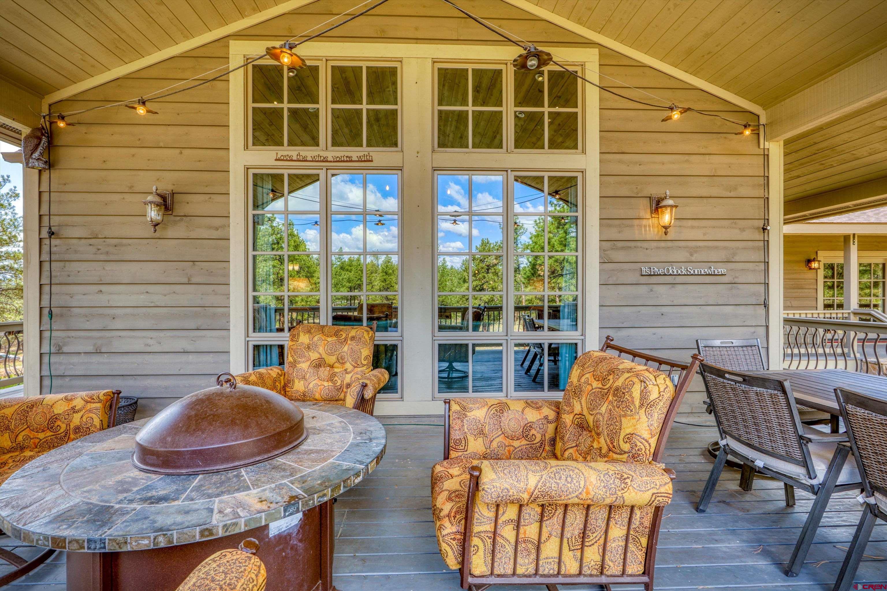 171 South Squaw Canyon Place Pagosa Springs, CO 81147 - Photo 4 of 45 a outdoor living space with furniture and a potted plant