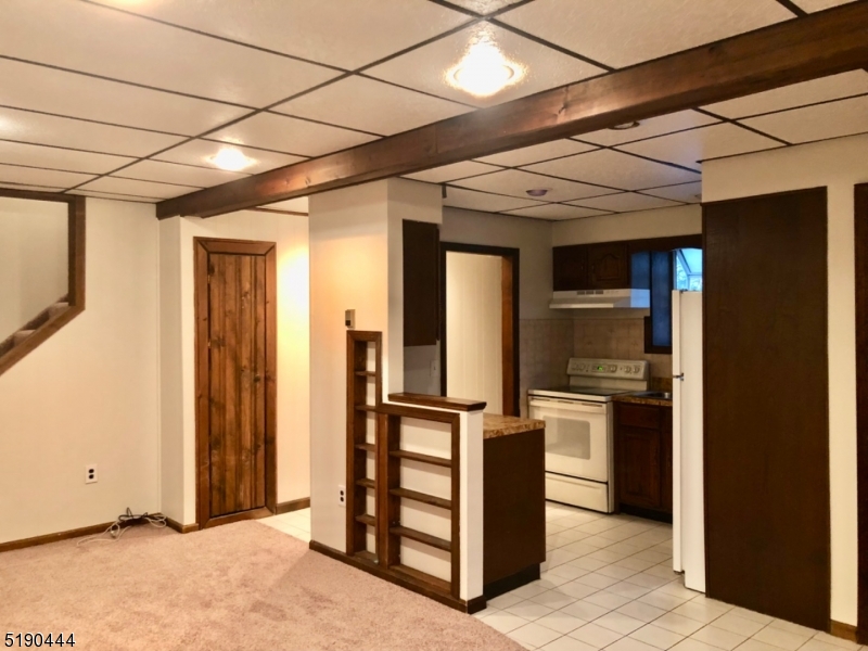 27 Old Rte 23 West Milford, NJ 07435 - Photo 2 of 14 a view of a hallway with wooden shelves