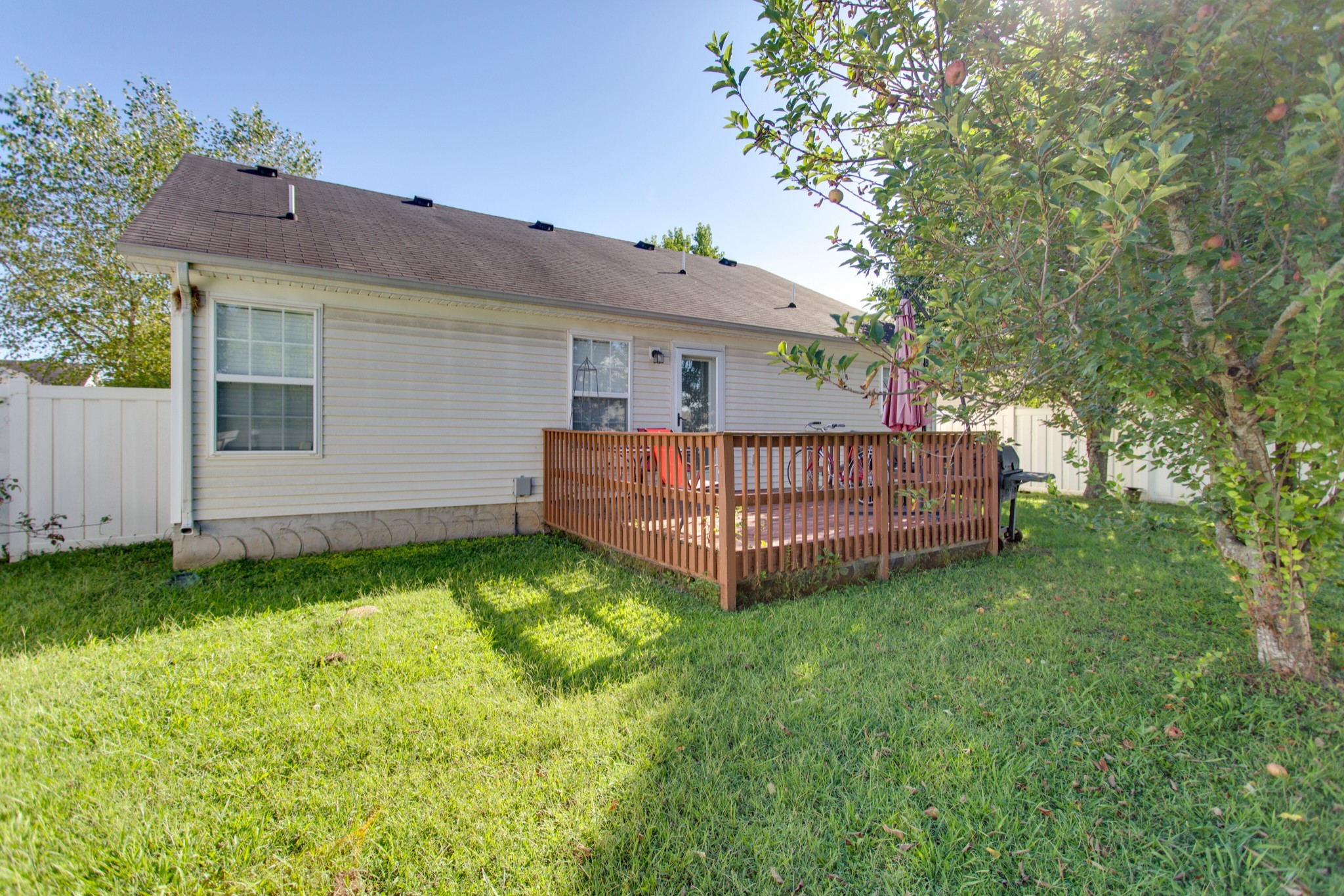 2214 Cason Trail Murfreesboro, TN 37128 - Photo 13 of 13 a view of backyard with a garden and deck