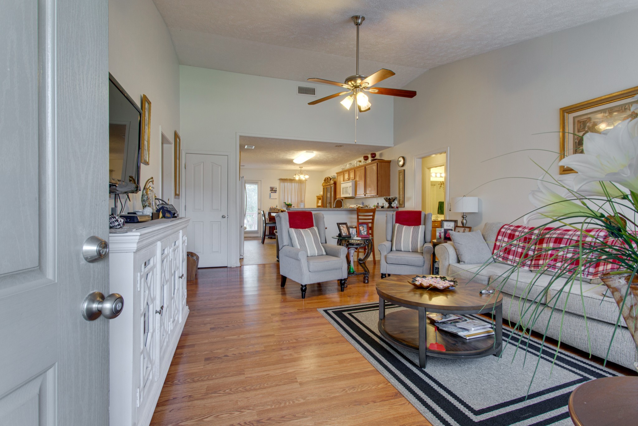 2214 Cason Trail Murfreesboro, TN 37128 - Photo 2 of 13 a living room with furniture and a chandelier