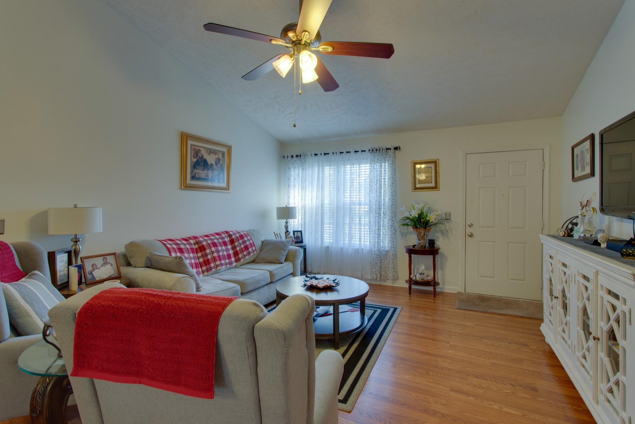 2214 Cason Trail Murfreesboro, TN 37128 - Photo 4 of 13 a living room with furniture and a flat screen tv