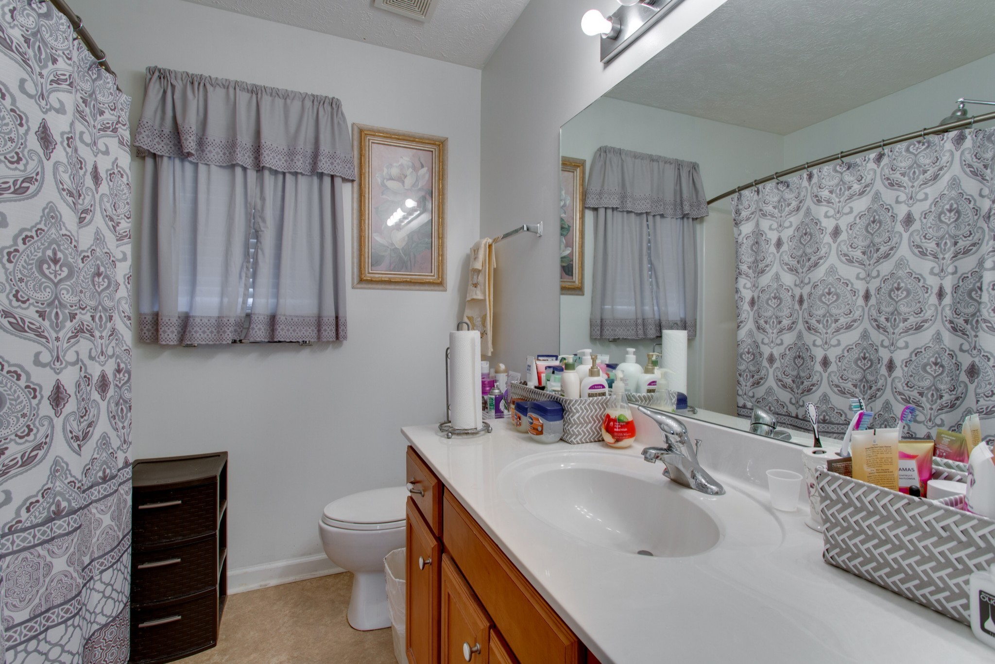 2214 Cason Trail Murfreesboro, TN 37128 - Photo 9 of 13 a bathroom with a sink toilet and shower