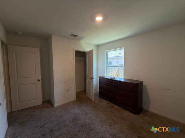 124 Niven Path Jarrell, TX 76537 - Photo 10 of 13 an empty room with windows