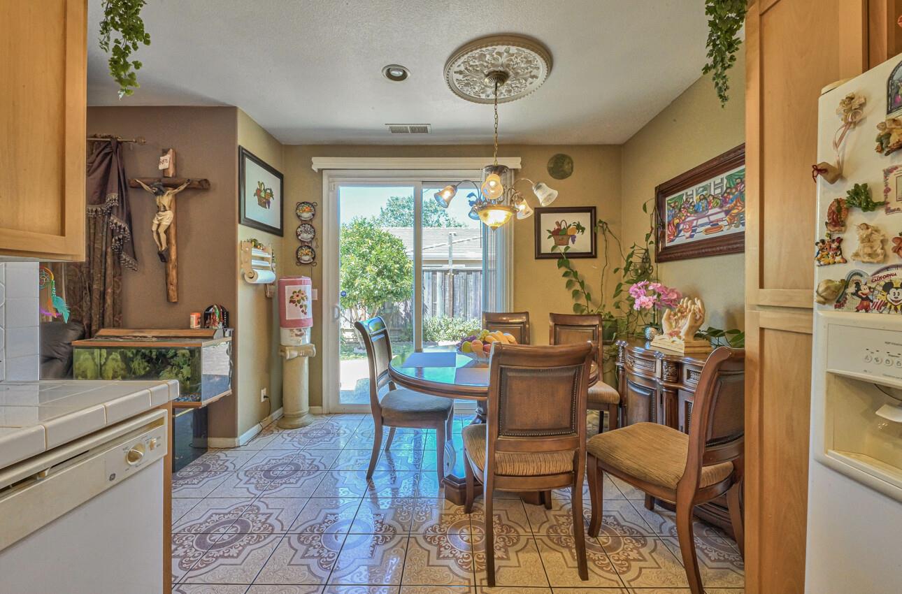 1013 Capri Way Salinas, CA 93905 - Photo 11 of 23 a view of a dining room with furniture window and outside view